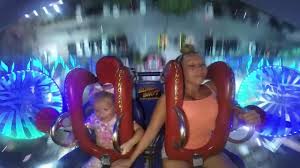 Top 10 girl slingshot ride fails. Mom Freaks Out While Riding Slingshot Ride With Daughter Jukin Media Inc
