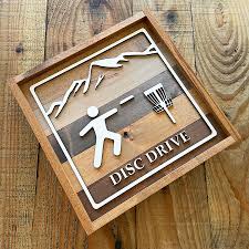 disc golf wooden rec sign disc drive