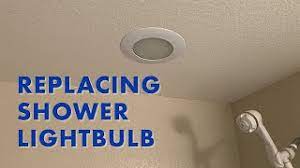 shower light bulb recessed to the wall