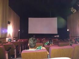 Small Theater Almost Every Seat Filled When Movie Started