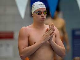 leon marchand among college swimmers at