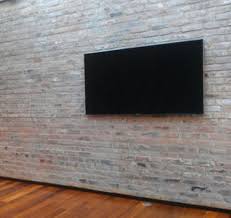 brick wall tv wall mounted tv tv mounted