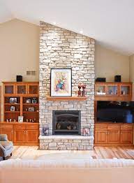 great room with stone fireplace to