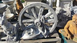 wagon wheel concrete garden ornament