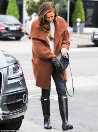 It can be a mix of vintage, thrift store finds and unique boots or fancy jackets. Minka Kelly Shows Off Her Rainy Day Fashion As She Covers Up Her Incredible Figure In A Big Fuzzy Coat And Galoshes Daily Mail Online