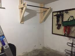 So we made one out of plywood and a dowel. Diy Pull Up Bar Homegym