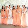 If you're looking for a more formal style for your bridesmaids dresses, think about lengthening the hemline of your friends' dresses to add a touch of tradition and chic style. 1