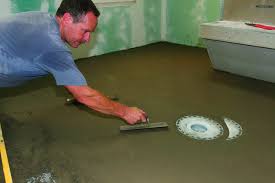 a sloping floor for a barrier free bath