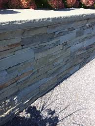 Stacked Stone Veneer Retaining Wall