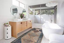 Large transitional master bathroom in melbourne with shaker cabinets, white cabinets, a freestanding tub, a curbless shower, gray tile, an undermount sink, grey floor, a hinged shower door, grey benchtops, a double vanity and a floating vanity. 99 Design Forward Bathroom Design Ideas Hgtv