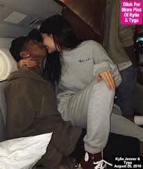 kylie jenner tyga kiss on an airplane
