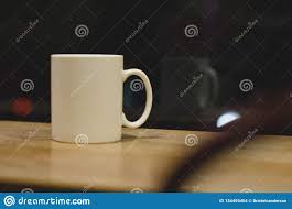 A Lone Single Coffee Cup In The Window Stock Photo Image