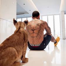 This is a sponsored article on nu.nl. Memphis Depay Channels His Inner Tiger King As Lyon Star Poses With Liger And Shows Off Big Cat Tattoo The Sun Thesatorireport