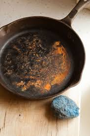 re a rusty cast iron skillet