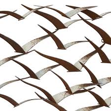 Litton Lane Metal Brown Flying Flock Of Bird Wall Decor