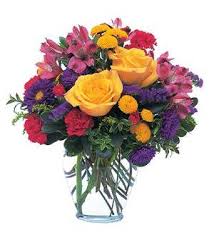 So, let them know how much it means to you with this colorful assortment of cheerful blooms, thoughtfully arranged standard orders will be arranged approximately as shown on our website. Brighten Your Day Tf107 1 55 76