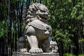Stone Sculpture Of A Big Lion Located