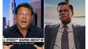 Him standing beside a tall guy. Real Life Wolf Of Wall Street Jordan Belfort Says Bitcoin Is A Massive Scam