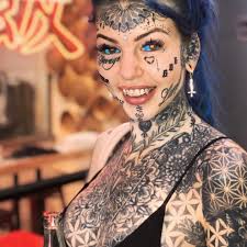 Certified tattoo artists begin working after chalking out a strategy to place the new design and color cautiously on the previous tattoo. Dragon Girl Who Went Blind After Tattooing Her Eyeballs Shares Draw Dropping Photos Before Her Transformation