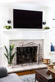 diy lime washed brick fireplace bless