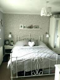 grey brick wall bedroom