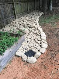 is dry creek bed better than french drain