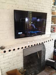 Tv Mounting Over A Brick Fireplace With