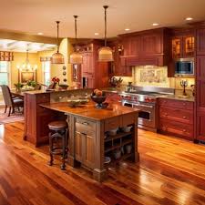 grey wood floors with cherry cabinets
