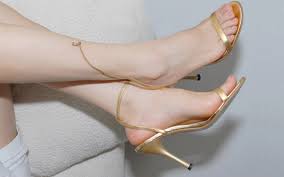 woman legs high heels sandals