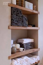 If you struggle to keep your towel storage looking neat, then keep them contained in a basket. 25 Brilliant Built In Bathroom Shelf And Storage Ideas To Keep You Organized With Style The Trending House
