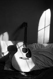 acoustic guitar darkness