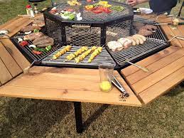 Fire Pit Is A Grill And Dining Table