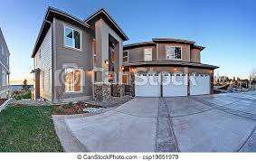 Luxury big house with high column porch. Luxury house exterior with three  car garage and driveway. evening view. | CanStock gambar png