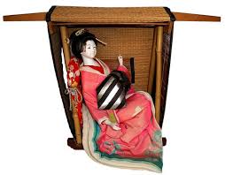 anese antique geisha doll sitting in