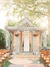 wedding ceremony aisle with bohemian rugs