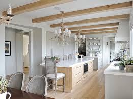 White and wood are natural complements, and white kitchens can look great with oak or walnut wood floors. Hot Look 40 Light Wood Kitchens We Love House Home
