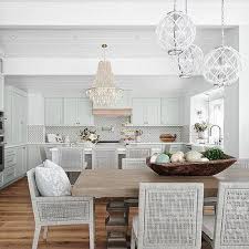 Beige Wicker Chairs At Round Glass Top