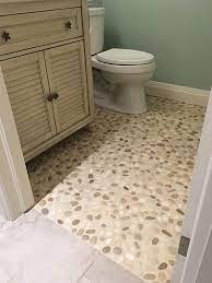 java tan and white pebble bathroom