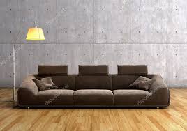 A Modern Brown Sofa And Lamp Against