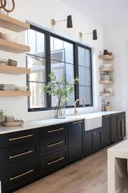 Black kitchen cabinets gold hardware. The Forest Modern Kitchen Q A The House Of Silver Lining