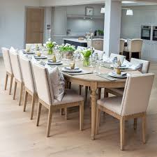 Its a very large dining table and is available with a huge choice of chairs and benches to suit your requirements. Brunswick Extending Weathered Oak Dining Table