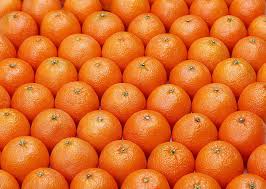 orange lot mandarins background ripe