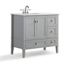 Make the most of your bathroom renovation by installing a new bathroom vanity. Simpli Home Chelsea 36 In Gray Bathroom Vanity With Marble Top Lowe S Canada