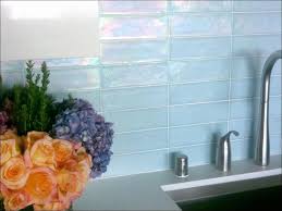 A ledger board temporarily supports tiles until the adhesive cures, keeping them level where there is no countertop. Glass Tile Backsplash Lowes Modern Design From Learn More About Glass Tile Backsplash And Installation Pictures