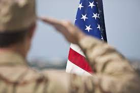 veterans saluting in civilian clothes