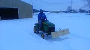 plowing snow with homemade snow plow