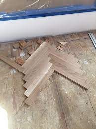 what causes new wood floors to squeak