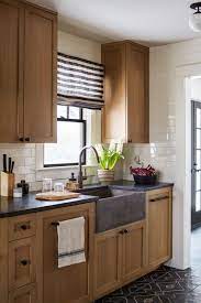 wood cabinets in the kitchen making a