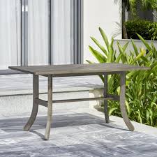 hand sed acacia patio dining table