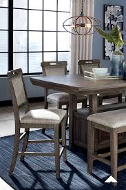 Ashley licenses its name to ashley furniture homestores located throughout north america. Johurst Country Height Dining Room Set By Ashley Furniture Industries Inc Reminiscent Of Lodge Style Furnishi Dining Chairs Dining Bench Metal Dining Chairs